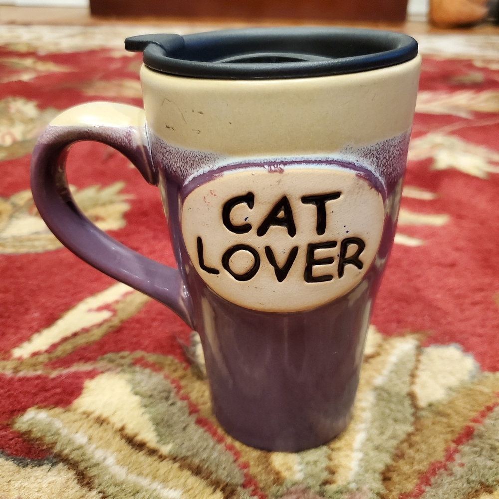 Tall cat lover purple mud with lid.
